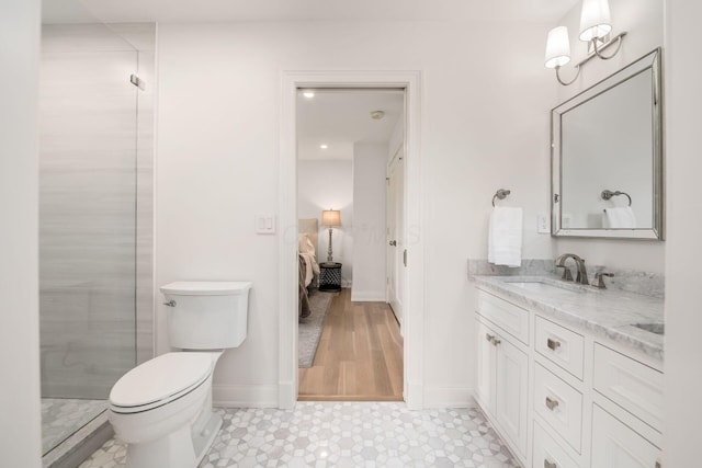 2252 Club Rd, Upper Arlington, OH 43221 - ensuite bathroom with a shower stall, toilet, vanity, baseboards, and ensuite bathroom
