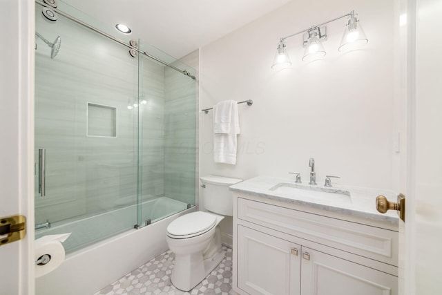 2252 Club Rd, Upper Arlington, OH 43221 - bathroom with vanity, shower / bath combination with glass door, and toilet
