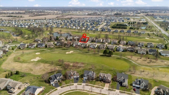 birds eye view of property featuring golf course view and a residential view