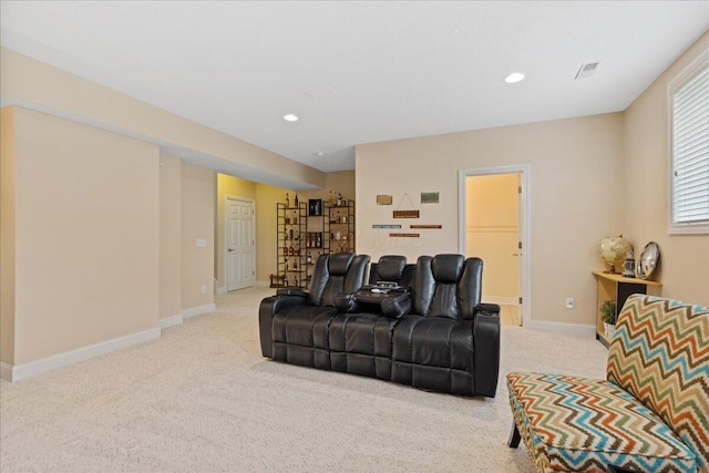 living area featuring recessed lighting, visible vents, baseboards, and carpet floors