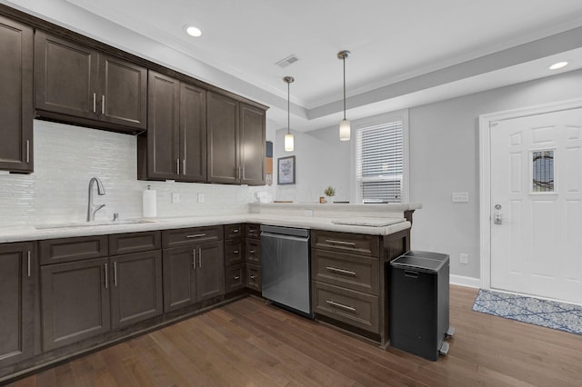kitchen featuring crown molding, stainless steel dishwasher, dark brown cabinetry, and a sink