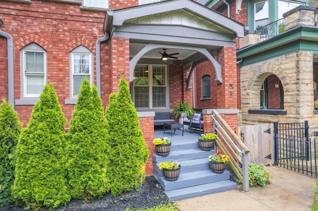 62 Sherman Ave, Columbus, OH 43205 - view of exterior entry featuring a porch, ceiling fan, and brick siding