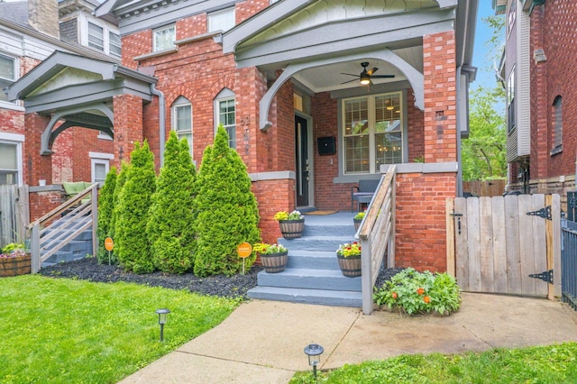 62 Sherman Ave, Columbus, OH 43205 - property entrance featuring brick siding, ceiling fan, a porch, and a gate
