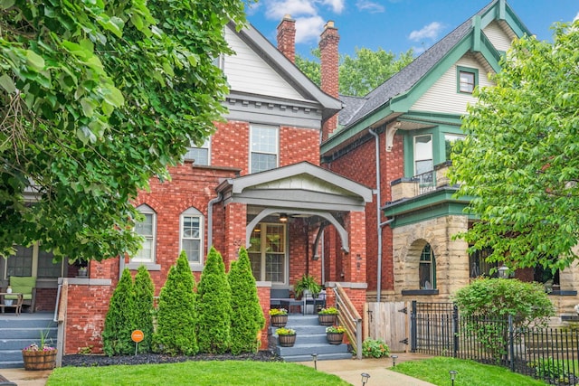 62 Sherman Ave, Columbus, OH 43205 - view of front of home with brick siding and a chimney