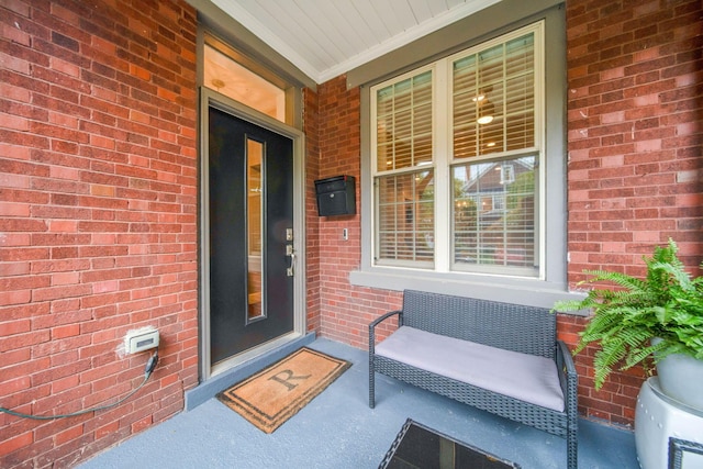 62 Sherman Ave, Columbus, OH 43205 - property entrance featuring covered porch and brick siding