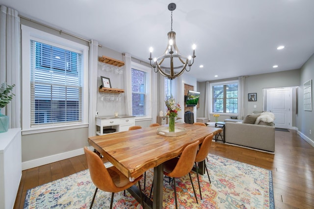 62 Sherman Ave, Columbus, OH 43205 - dining area with a chandelier, dark wood-type flooring, baseboards, and recessed lighting