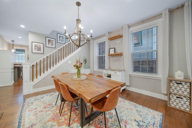 62 Sherman Ave, Columbus, OH 43205 - dining area featuring wood-type flooring, a chandelier, stairs, recessed lighting, and baseboards