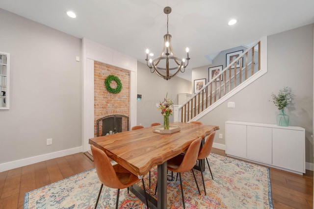 62 Sherman Ave, Columbus, OH 43205 - dining area featuring a chandelier, light wood-style flooring, baseboards, stairs, and recessed lighting
