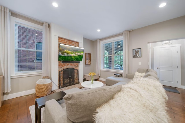 62 Sherman Ave, Columbus, OH 43205 - living room with baseboards, a brick fireplace, wood finished floors, and recessed lighting