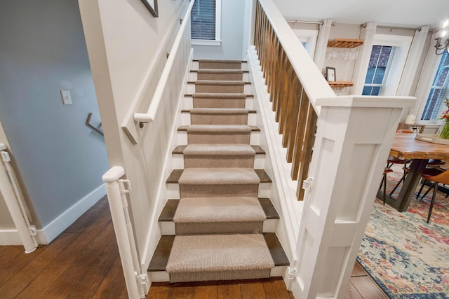 62 Sherman Ave, Columbus, OH 43205 - stairway with hardwood / wood-style floors and baseboards