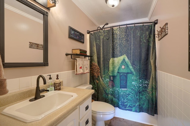 full bath featuring crown molding, vanity, toilet, curtained shower, and tile walls