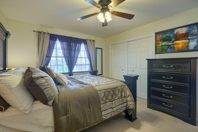 bedroom with carpet flooring, a closet, and ceiling fan