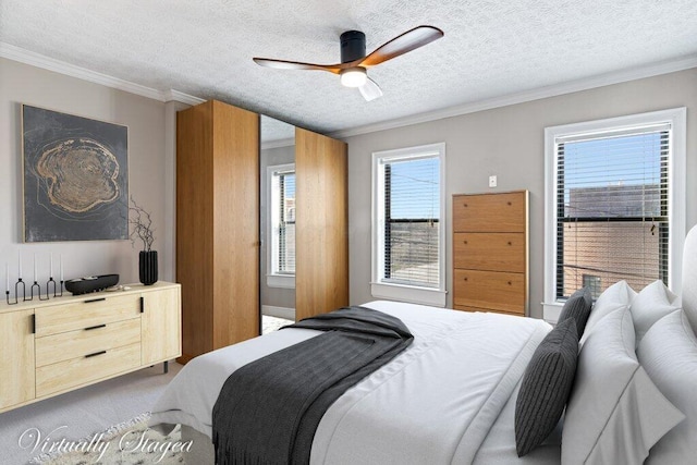 210 Warren St, Columbus, OH 43215 - carpeted bedroom featuring crown molding, a textured ceiling, and ceiling fan