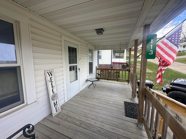 113 Chestnut St SE, Corning, OH 43730 - wooden deck with a porch