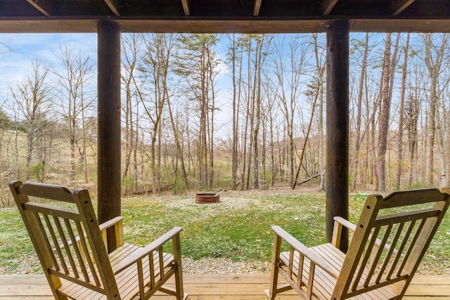 26063 Twin Fls, Rockbridge, OH 43149 - wooden deck with an outdoor fire pit and a lawn