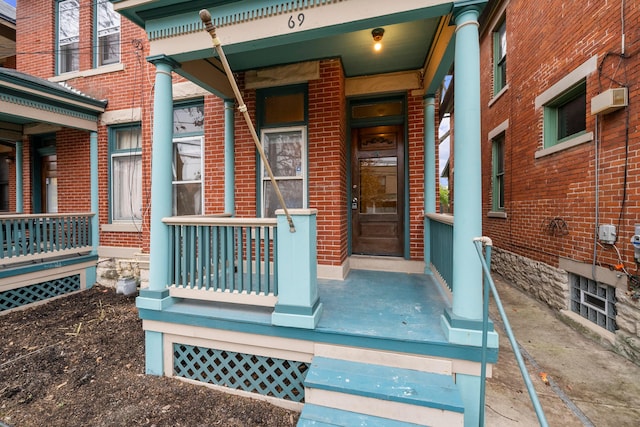 69-71 E 1st Ave, Columbus, OH 43201 - property entrance with a porch and brick siding