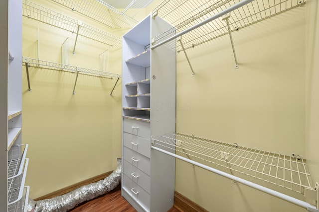 69-71 E 1st Ave, Columbus, OH 43201 - walk in closet featuring dark wood finished floors