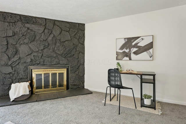 5696 Great Hall Ct, Columbus, OH 43231 - carpeted office with a textured ceiling, a fireplace, and baseboards