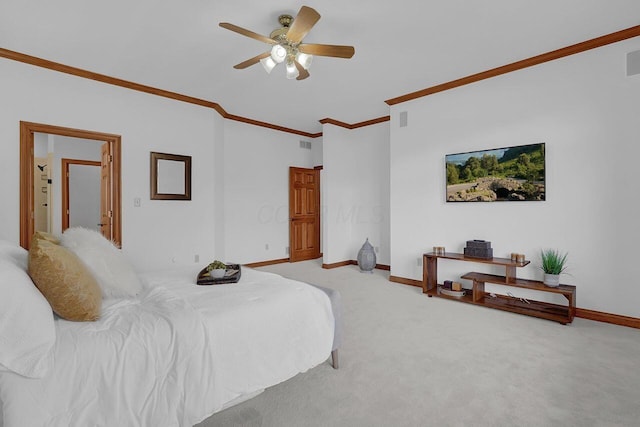 bedroom featuring light colored carpet, ornamental molding, baseboards, visible vents, and a ceiling fan