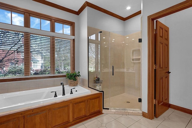 full bath with tile patterned floors, a bath, a stall shower, and crown molding