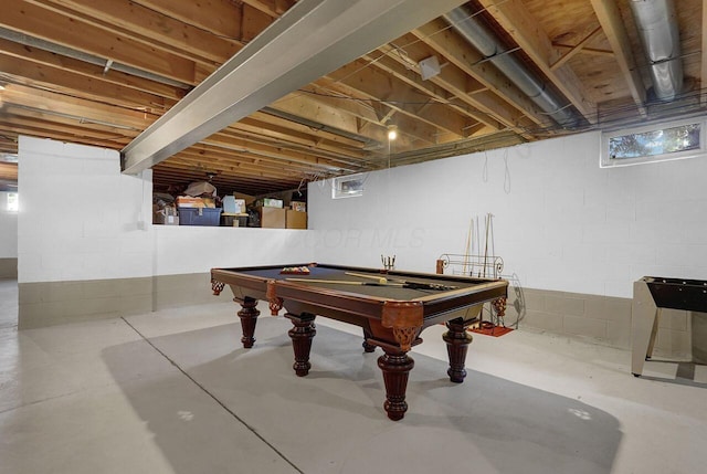 playroom with concrete floors and pool table