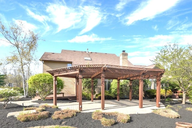 surrounding community featuring a pergola and a patio