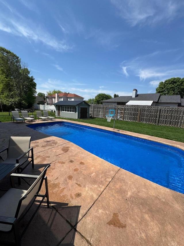 711 James Way, Marion, OH 43302 - view of pool featuring an outdoor structure, a fenced backyard, and a patio