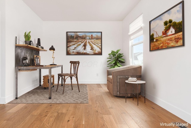 3805 Aviary Loop, Hilliard, OH 43026 - living area with baseboards and light wood-style floors