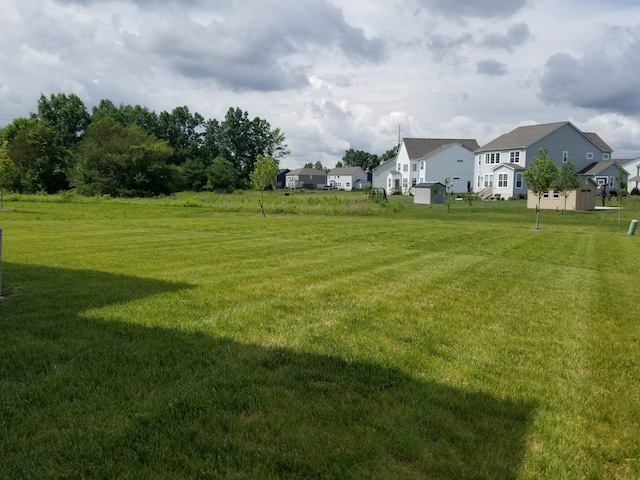 view of yard with a residential view