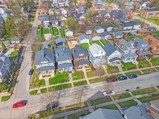 birds eye view of property with a residential view