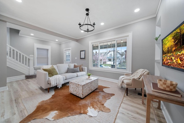 living area with stairs, wood finished floors, recessed lighting, baseboards, and ornamental molding