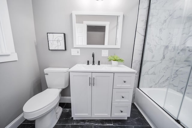 bathroom with baseboards, shower / bath combination with glass door, toilet, and vanity