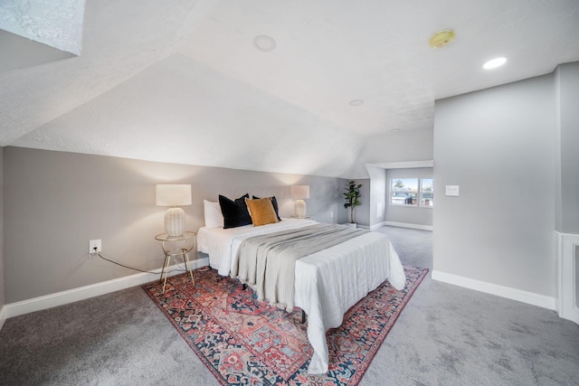 bedroom with baseboards, vaulted ceiling, recessed lighting, and carpet flooring