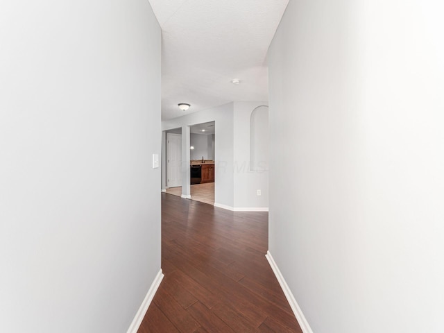 6088 Sowerby Ln, Westerville, OH 43081 - hall featuring baseboards and dark wood-style floors