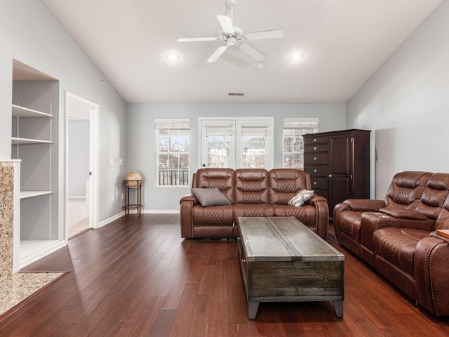 6088 Sowerby Ln, Westerville, OH 43081 - living area featuring vaulted ceiling, baseboards, dark wood finished floors, a ceiling fan, and built in features