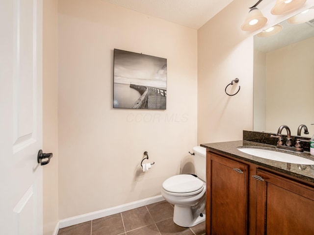 6088 Sowerby Ln, Westerville, OH 43081 - half bathroom featuring tile patterned flooring, vanity, toilet, and baseboards