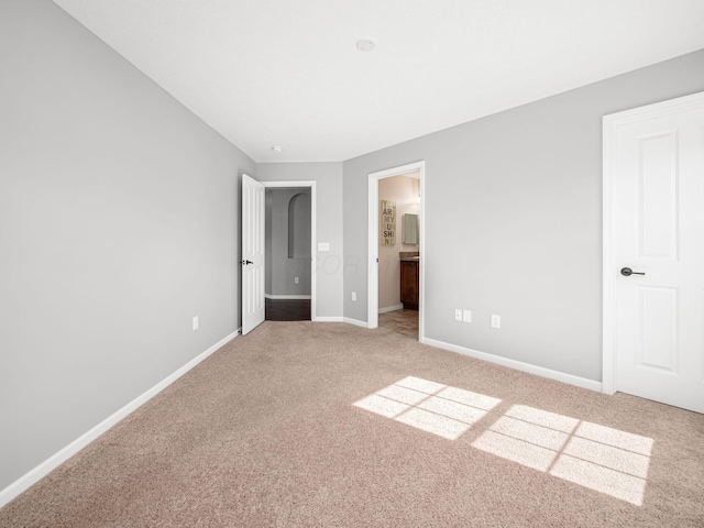 6088 Sowerby Ln, Westerville, OH 43081 - unfurnished bedroom featuring baseboards, ensuite bath, and carpet