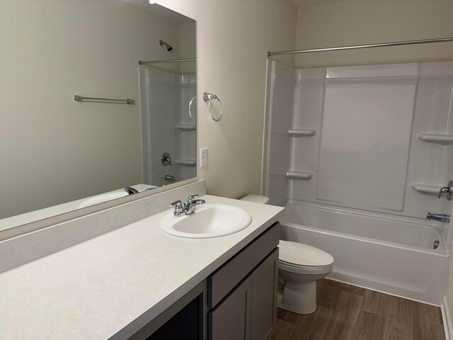 280 Dowler Dr Lot 349, South Bloomfield, OH 43103 - bathroom with vanity, shower / bath combination, and wood finished floors