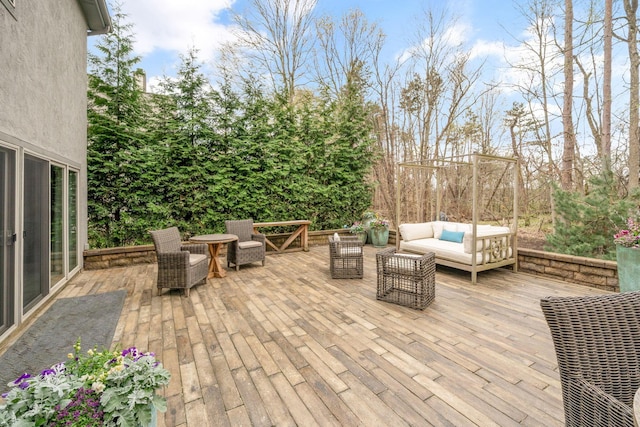 deck with an outdoor hangout area