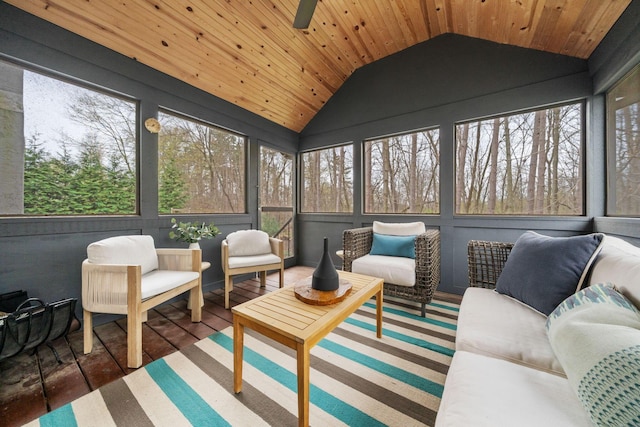 sunroom / solarium with an outdoor living space and plenty of natural light