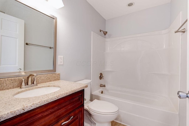 full bath featuring washtub / shower combination, vanity, and toilet