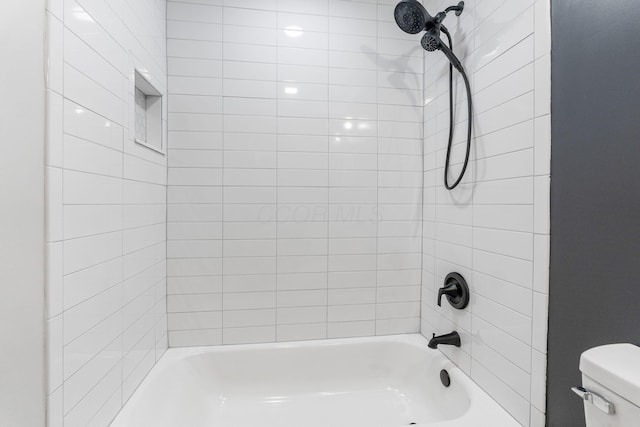 full bath with toilet and washtub / shower combination