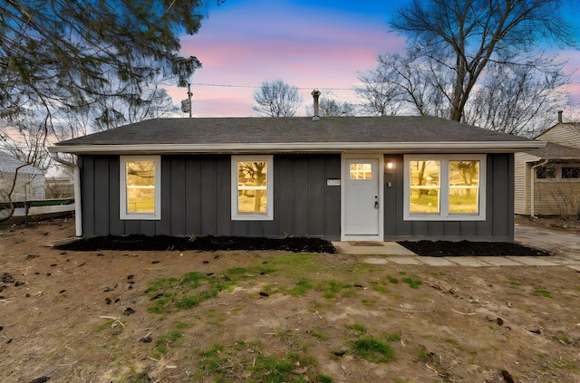 ranch-style home with board and batten siding