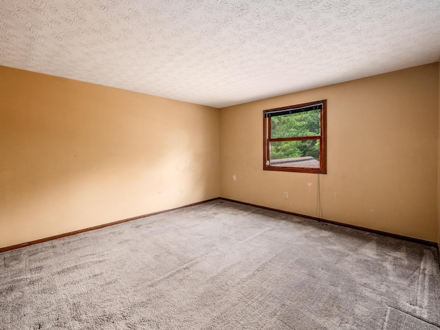 162 Juniper Ave, Westerville, OH 43081 - carpeted spare room featuring a textured ceiling