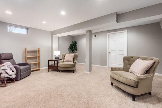 sitting room featuring baseboards, visible vents, recessed lighting, and light colored carpet
