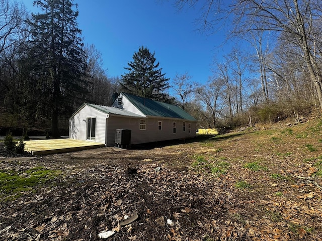 9808 Alderman Rd, Millfield, OH 45761 - view of property exterior with metal roof and a deck
