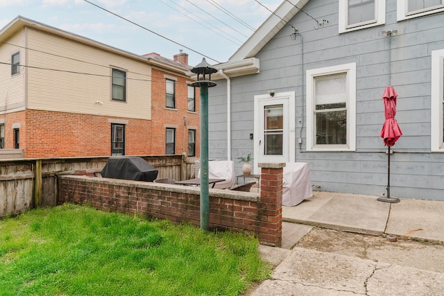 back of property with fence
