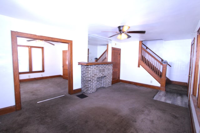 1256 S Champion Ave, Columbus, OH 43206 - unfurnished living room with stairway, ceiling fan, and baseboards