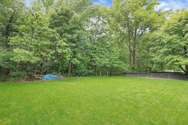 572 Sycamore Dr, Pickerington, OH 43147 - view of yard with a wooded view