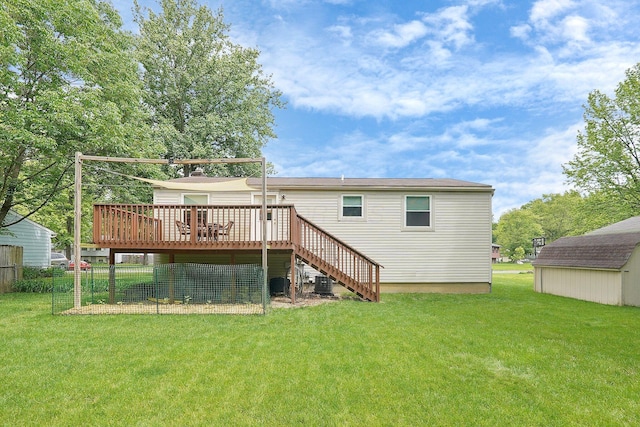 572 Sycamore Dr, Pickerington, OH 43147 - back of house with a deck, stairway, central AC, and an outbuilding